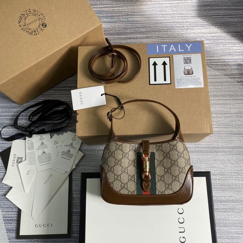 G*u*i top handle bags